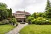 Wunderschönes Einfamilienhaus mit Garage und traumhaftem Garten - Ein wahres Juwel! - Blick auf das Haus aus dem Garten