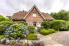Wunderschönes Einfamilienhaus mit Garage und traumhaftem Garten - Ein wahres Juwel! - Frontansicht