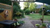 Gepflegtes Mehrgenerationenhaus auf großem Grundstück,PV-Anlage und 13ha landwirtschaftlichen Flächen - Terrasse mit Blick in den Garten
