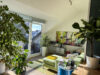 Charmante Eigentumswohnung - lichtdurchflutet, mit Südbalkon und Gemeinschaftsgarten - Wohnzimmer