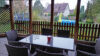 Einfamilienhaus in der Natur mit Platz für die Familie und das Homeoffice - Ausblick von der Terrasse in den Garten