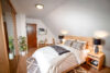 Großzügiges Einfamilienhaus am See – perfekt für große Familien - Virtual Staging - Schlafzimmer