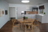 Haus mit Einliegerwohnung am See – großzügig, vielseitig und perfekt für Familien - Virtuel Staging - Küche mit Eßbereich