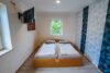 Hochwertiger KfW-70-Bungalow. Modernes Wohnen auf einer Ebene in Tespe. - Schlafzimmer