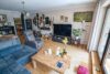 Großzügige 3-Zimmer-Eigentumswohnung mit zwei Balkonen, Aufzug und Tiefgarage - Wohnzimmer