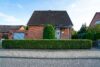 Familienfreundliches Einfamilienhaus mit Garten in angenehmer Wohngegend - Straßenansicht